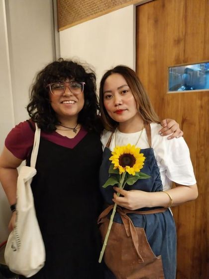 One of our founders with a happy customer. We have formed so many friendships and shared so much love in this space, and we are grateful for every connection.