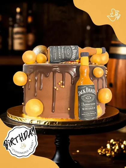 Cheers to a bold celebration with this Jack Daniel's themed cake. It features edible whiskey bottle replicas and a rich chocolate truffle base, making it a perfect surprise for a milestone birthday.