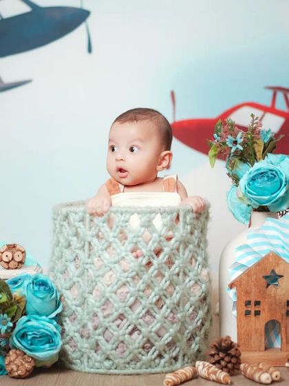 A wider view of the airplane theme, showing the creative and fun backdrops I use to bring your vision to life.