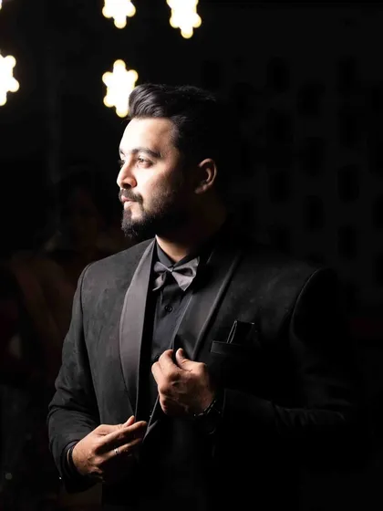 Dressed for a glamorous reception night. My job is to match the vibe of your event, and for a black-tie sangeet or cocktail party, I bring my A-game with a sharp, stylish look.