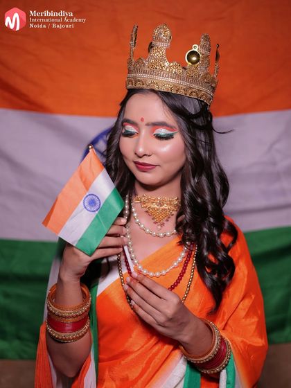 The complete look, with a tricolor saree and a crown, representing Bharat Mata. This is a powerful example of thematic makeup.