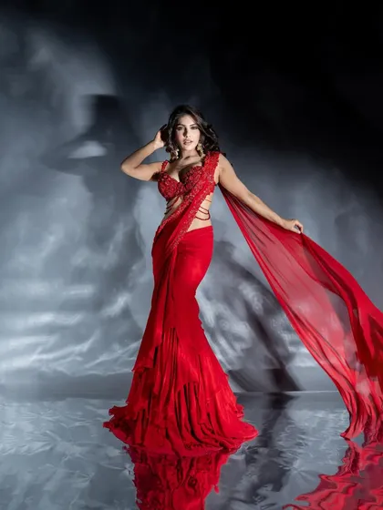 Capturing movement and energy is key in fashion photography. In this studio shot with Ishita Raj, I worked with flowing fabric and dramatic lighting to create a dynamic and visually arresting image.