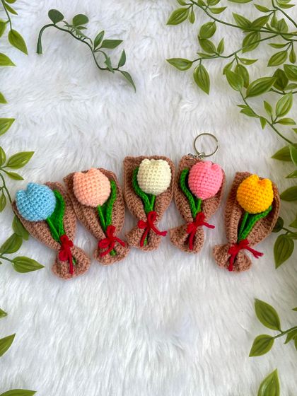 A set of mini tulip bouquet keychains in different colors. They are a cute and budget-friendly gift idea.