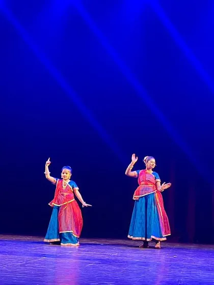 Our young performers in colorful costumes during a Kathak group dance. We focus on storytelling through dance, and this performance depicts a traditional tale with energy and grace.