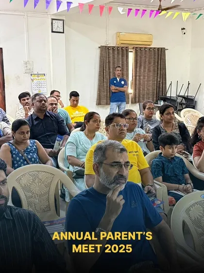 Parents listening attentively during the presentation at our annual meeting, where we discuss season plans and our philosophy.