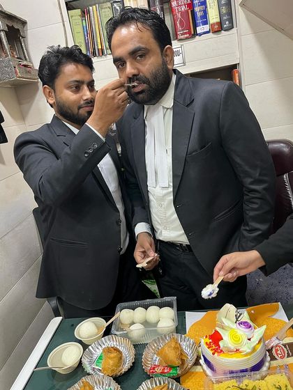 A moment of respect, sharing cake with my mentor on Teacher's Day.