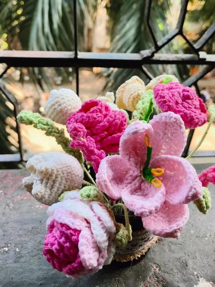 Another view of the pink flower basket, showing the variety of blooms. This would look so lovely on a windowsill or as a centerpiece.