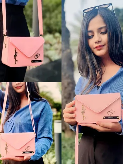 Here is my personalized envelope sling bag in baby pink, shown in action. You can customize it with a name and two charms of your choice, making it a unique and stylish accessory for everyday use or a special gift.