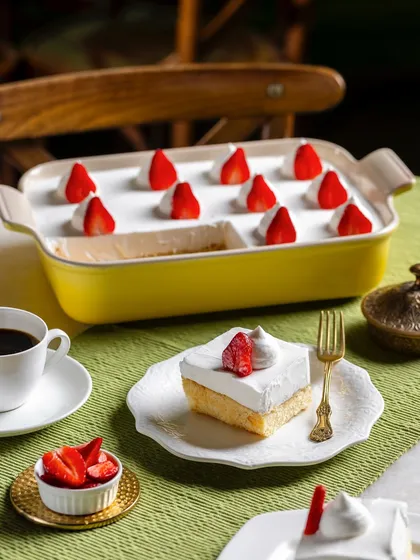 A Tres Leches cake for The Big Chill Cafe UAE, shown as a whole tray and a single slice. This helps customers visualize both individual portions and larger orders.