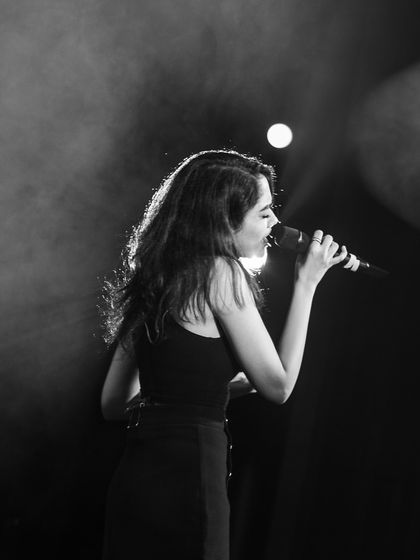 A classic black and white shot from a live performance. It captures the timeless feel of live music.