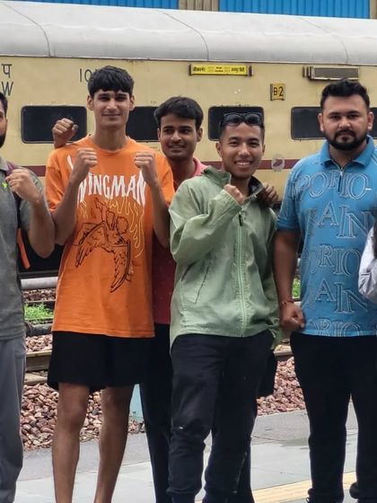 Another shot of the team on their way to the national championships, fists up and focused.