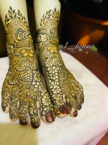 A full view of the intricate bridal leg design, showing the beautiful floral and geometric patterns created with my organic henna.