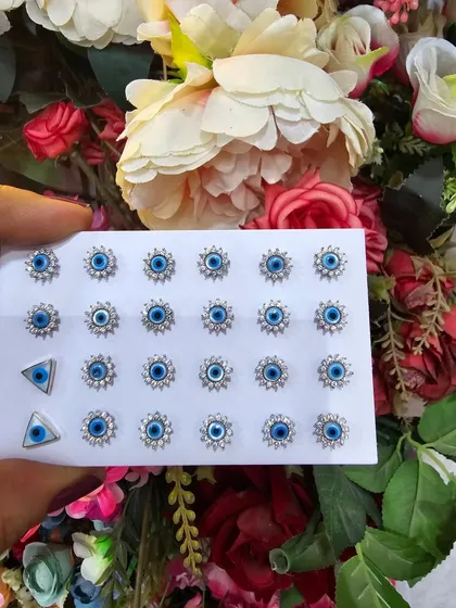 Another look at our evil eye stud collection, a customer favorite for both style and symbolism.