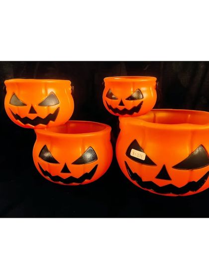 Another view of our nesting pumpkin candy bowls, showing how they can be arranged for a fun and festive Halloween display.