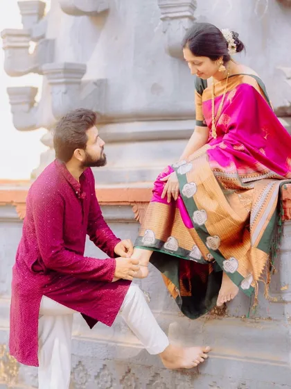 A romantic gesture captured during the shoot, showing the groom's affection for his bride-to-be. These small details tell a big story.