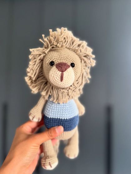 Toto the Lion, ready for his close-up. This amigurumi is sturdy enough for play and soft enough for cuddles.