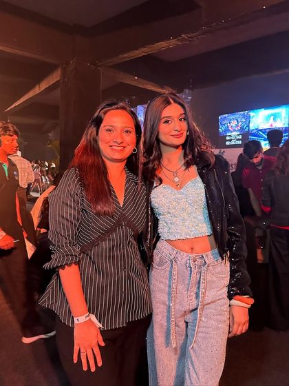 A casual photo with Payal after her event. It's rewarding to build a connection with my clients and be a part of their special moments.