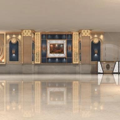 A look at the luxurious lobby or pre-function area of Grand Utsav banquet. The marble floors and ornate walls make a great first impression.