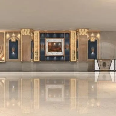 A look at the luxurious lobby or pre-function area of Grand Utsav banquet. The marble floors and ornate walls make a great first impression.