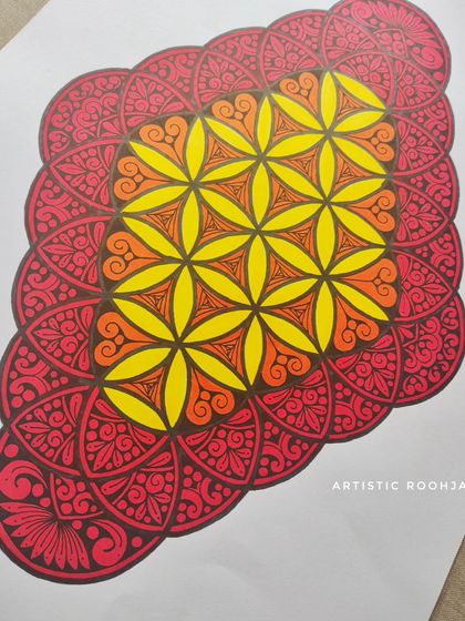 A finished, colorful mandala featuring the "Flower of Life" geometric pattern. In the course, you'll learn how to fill these sacred geometry patterns with intricate details and color gradients.