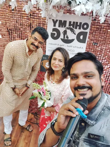 A fan moment with producer Smita Thackeray at a dog cafe event. My work as an emcee takes me to many unique and interesting events.