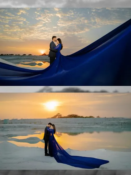 A breathtaking sunset shot with a couple and a massive blue trail gown against the reflective water of the white sand dunes. This is the kind of epic, cinematic shot we love to create.