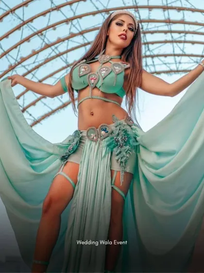 A stunning shot of one of our professional belly dancers, showcasing the beautiful costumes and artistry we bring to your event.