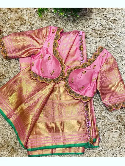 Creating matching mother-daughter outfits is one of my favorite things to do. Here is a complete set I designed, featuring a traditional pink and gold silk saree with two perfectly coordinated, hand-embroidered blouses for both mother and child. It’s a wonderful way to celebrate family bonds during festive seasons.