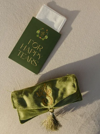 "For Happy Tears." A small but thoughtful detail, providing tissues for emotional moments during the ceremony.