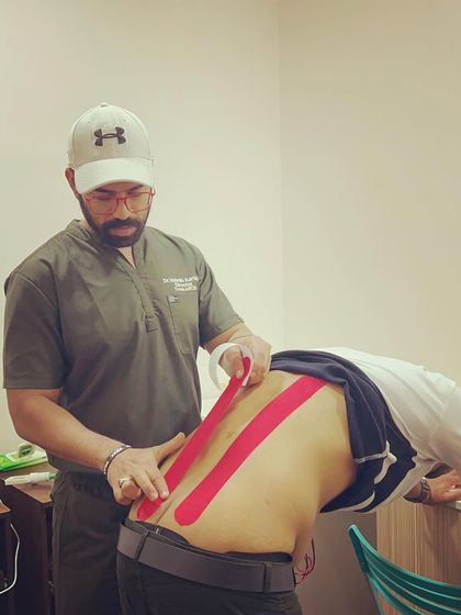 Applying multiple strips of kinesio tape allows us to provide comprehensive support to the lower back muscles, helping to alleviate pain and improve posture.