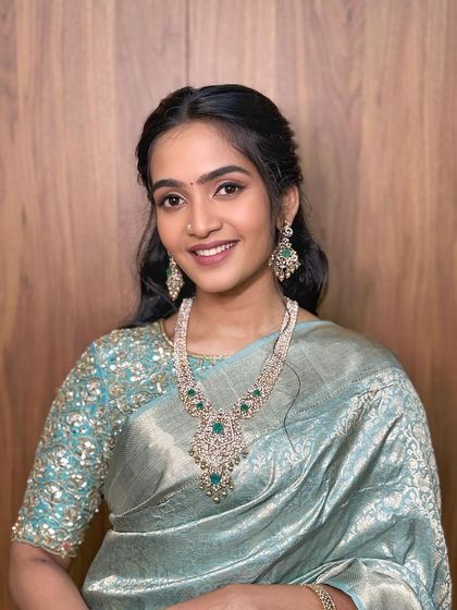 A beautiful portrait showcasing the client's radiant smile and elegant look.