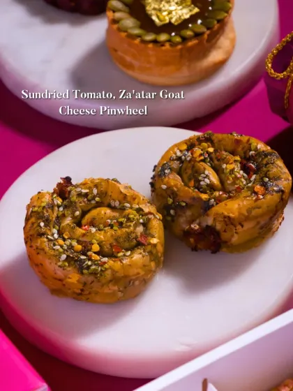 These are Sundried Tomato and Za'atar Goat Cheese Pinwheels. The savory swirls are packed with Mediterranean flavors and are perfect as a bite-sized appetizer for any event.