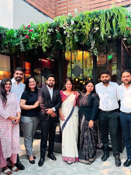 A group photo with my respected colleagues and team members at a professional gathering.