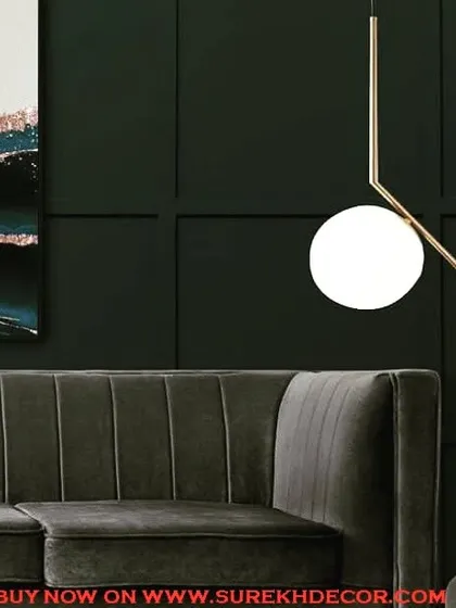 This globular milky white hanging light features a minimalist design with a single globe on a golden rod. It's a perfect example of modern simplicity, ideal for contemporary living spaces.
