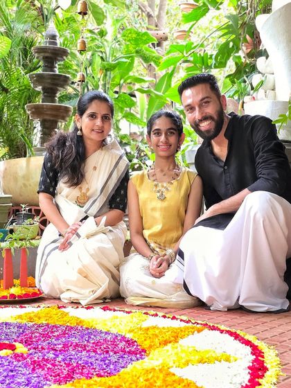 Celebrating Onam with my family. Our garden provides the perfect backdrop for our traditions and festivities, including the flowers for our Pookalam.
