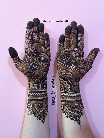 A classic design featuring intricate bands of traditional patterns, including jaali work and mandalas, for a timeless and elegant look.