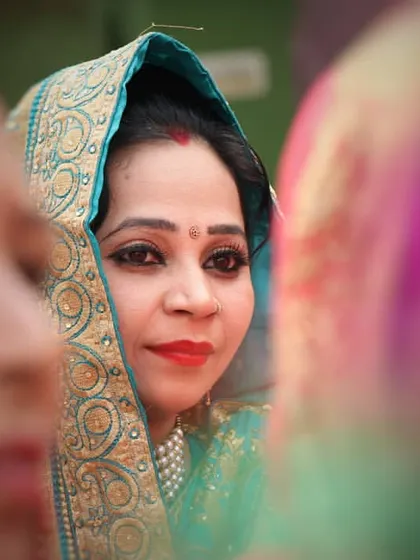 Another candid moment capturing a guest's expression during the wedding. These photos help to tell the complete story of your celebration, showing the joy shared by everyone present.