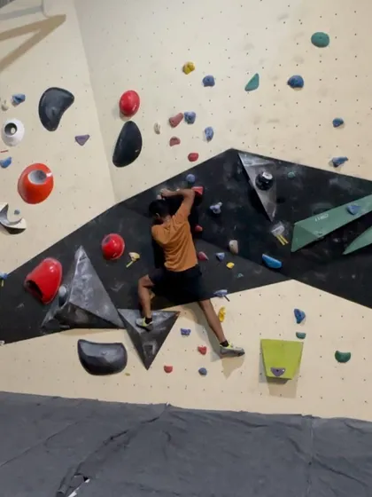 Here’s a climber getting focused on one of our routes. With a mix of holds and wall angles, you can always find a new bouldering problem to challenge your technique and strength.