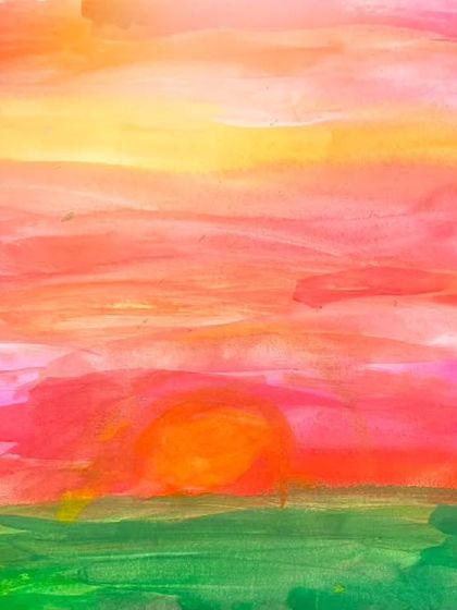 A beautiful sunset painted by a 6-year-old student. We explore different watercolor techniques to capture the soft blending of colors in the sky.