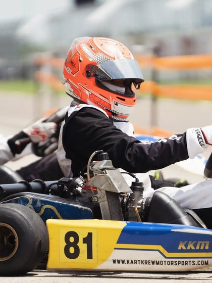 A driver in our number 81 kart, ready for action.