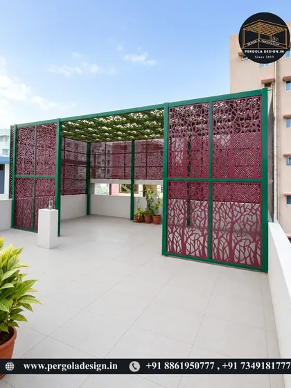 Our work is where engineering meets art. This custom-fabricated pergola features intricate, laser-cut panels with a tree motif, creating a visually stunning enclosure that provides shade and privacy while serving as a unique architectural statement.