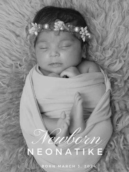 A beautiful and simple black and white birth announcement style photo. A classic way to introduce your little one to the world.