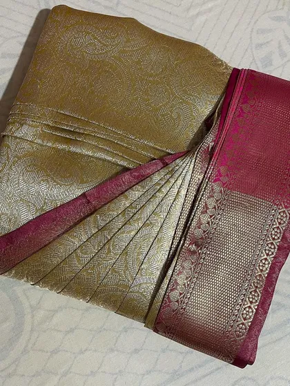 This is the beautiful result of my box folding technique on a rich Kanchipuram silk saree. The pleats are perfectly set and the saree is kept compact and crease-free, ready for any occasion.