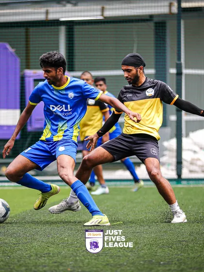 Intense on-pitch action during the Just Fives League Corporate Edition. I ensure every match is captured with professional photography, highlighting the competitive spirit and skill of players from companies like Dell.