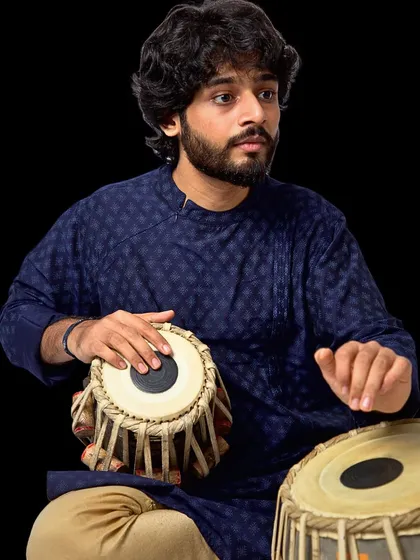 My life as a musician is a huge part of who I am, and I bring that artistic discipline to my modeling. This professional studio portrait with my tabla highlights my unique profile as an artist-model, ideal for campaigns that value authenticity and a connection to the arts.