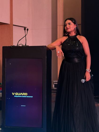 Leaning on the V-Guard podium, feeling the energy of the room. It’s these moments of connection that make an event truly successful.