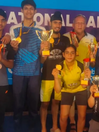 **A Team of Champions.** Our young shuttlers proudly display their gold and silver medals from the CBSE Team Event National Championship. At Sunrise Shuttlers, individual success is celebrated as a team achievement.