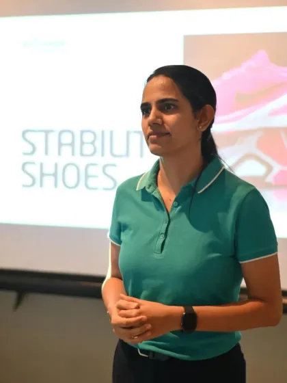 Standing with my presentation on stability shoes for the Nike Ekin community. The right shoe can make all the difference in a runner's performance and longevity.