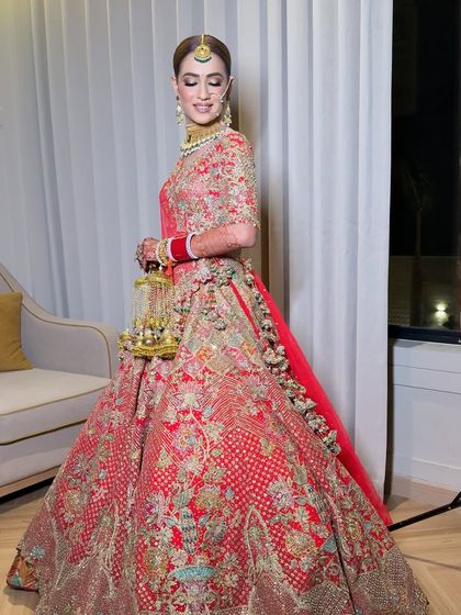 Another angle of this stunning bride, showing how the makeup and outfit work together to create a breathtaking silhouette.