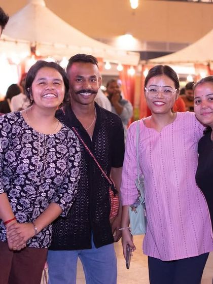 A group of friends and fans enjoying the open-air concert at Phoenix Marketcity.
